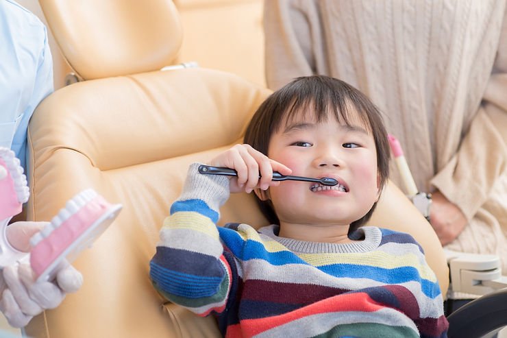 Helping your child to practice good oral hygiene from a young age.